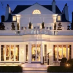 Luxury exterior view of the Anthony Joshua House showcasing modern architecture, elegant landscaping, and premium mansion design.