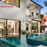 Ryan Garcia House featuring a modern luxury mansion exterior with elegant architecture, premium landscaping, and twilight lighting.