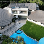Exterior view of Shohei Ohtani house in La Cañada Flintridge California with mid-century modern design and mature oak trees