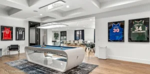 Modern luxury mansion exterior featured in Inside the Anthony Davis House with sleek architecture and elegant design details.