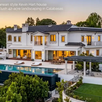 Exterior view of the Mediterranean style Kevin Hart house featuring an infinity pool and lush 42-acre landscaping in Calabasas.